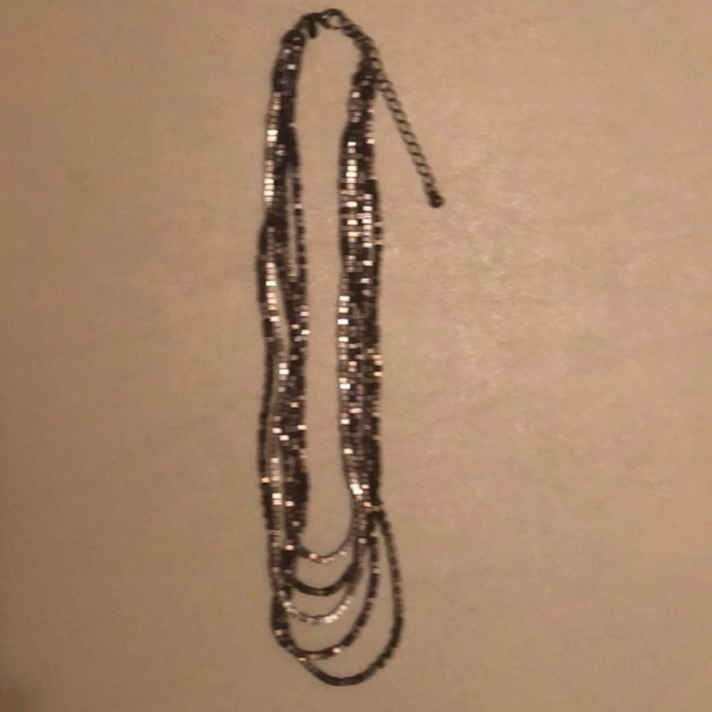 Necklace - Multi- strand in Gold, Copper and Brown colored beads